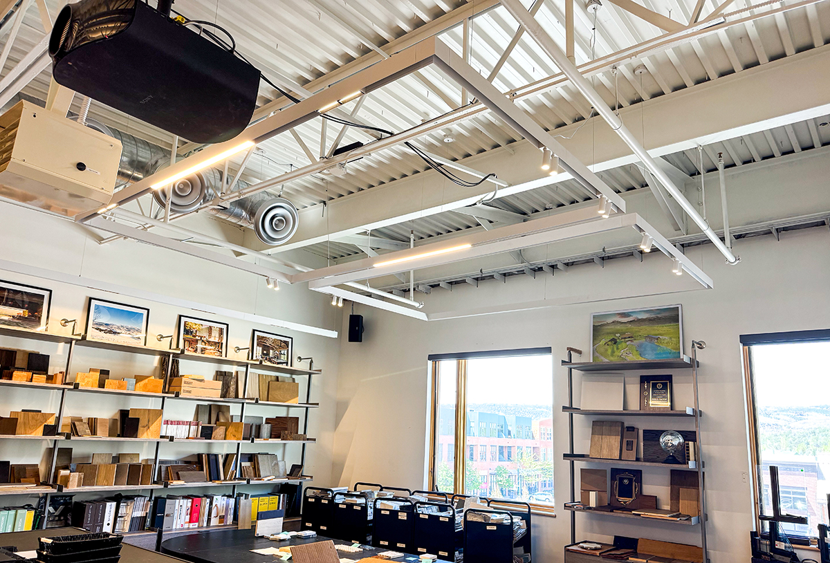 TechoLED Magnetic Track System LED Luminaire with multiple options of modules in modern office