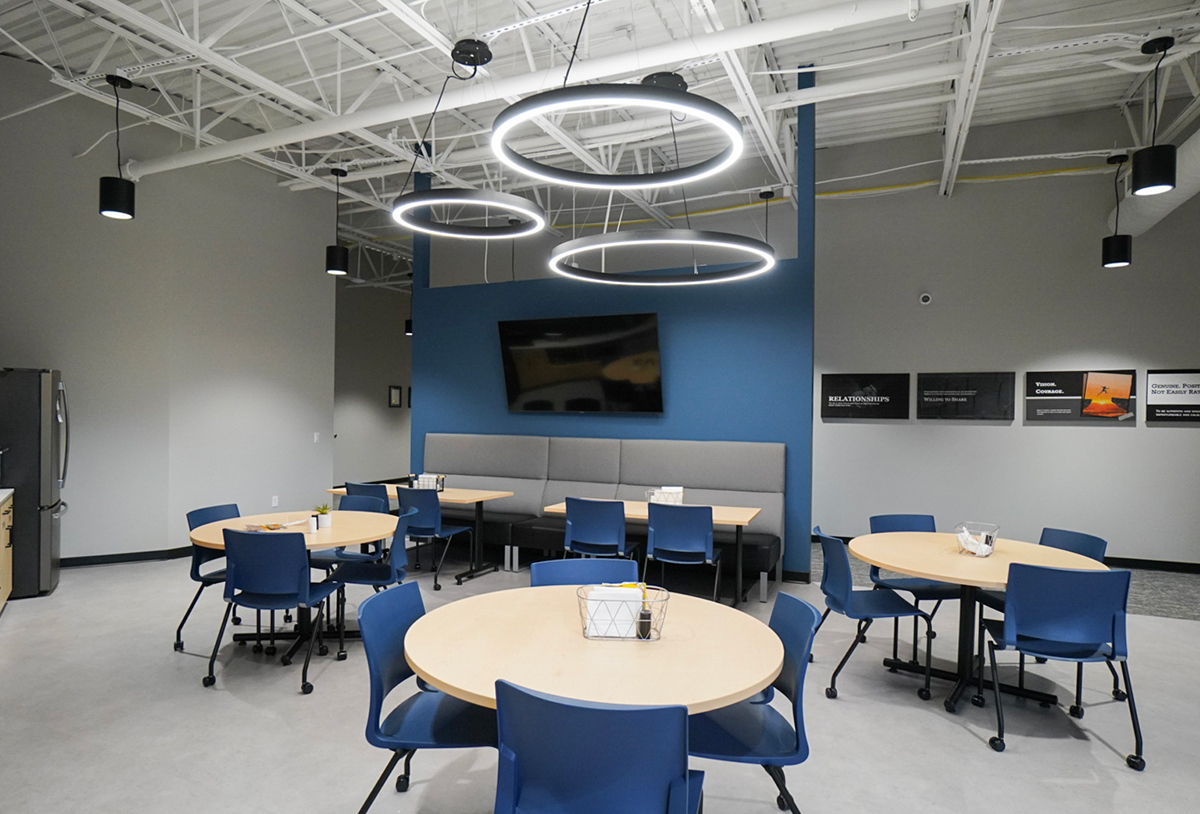 TechoLED Halo Direct Series pendant round LED luminaires in modern office