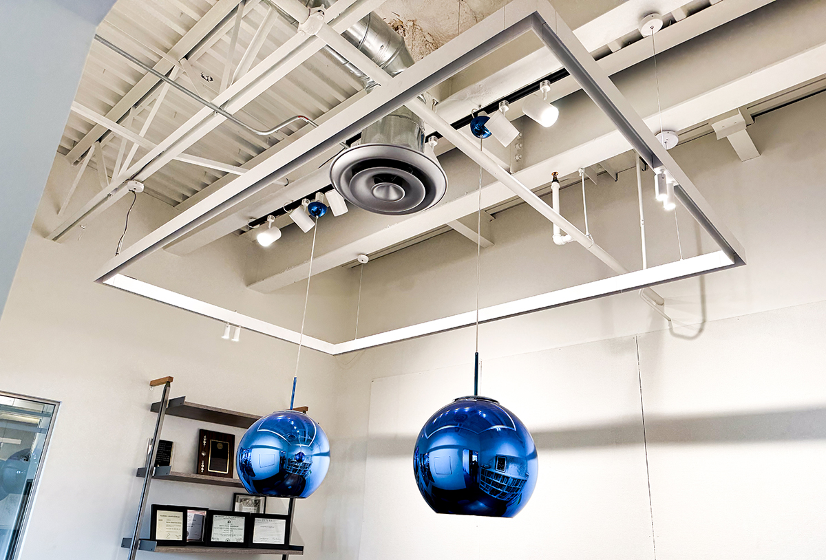 TechoLED Magnetic Track System LED Luminaire with multiple options of modules in modern office